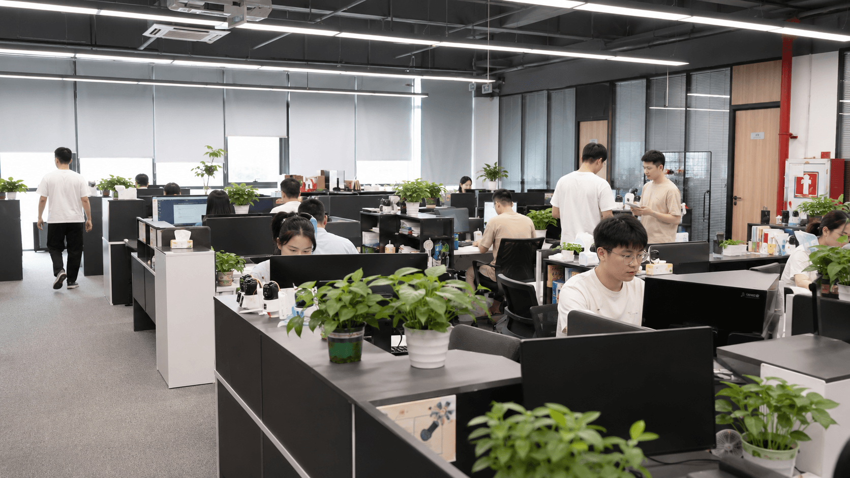 JBC Shenzhen office with security camera samples and team workspace