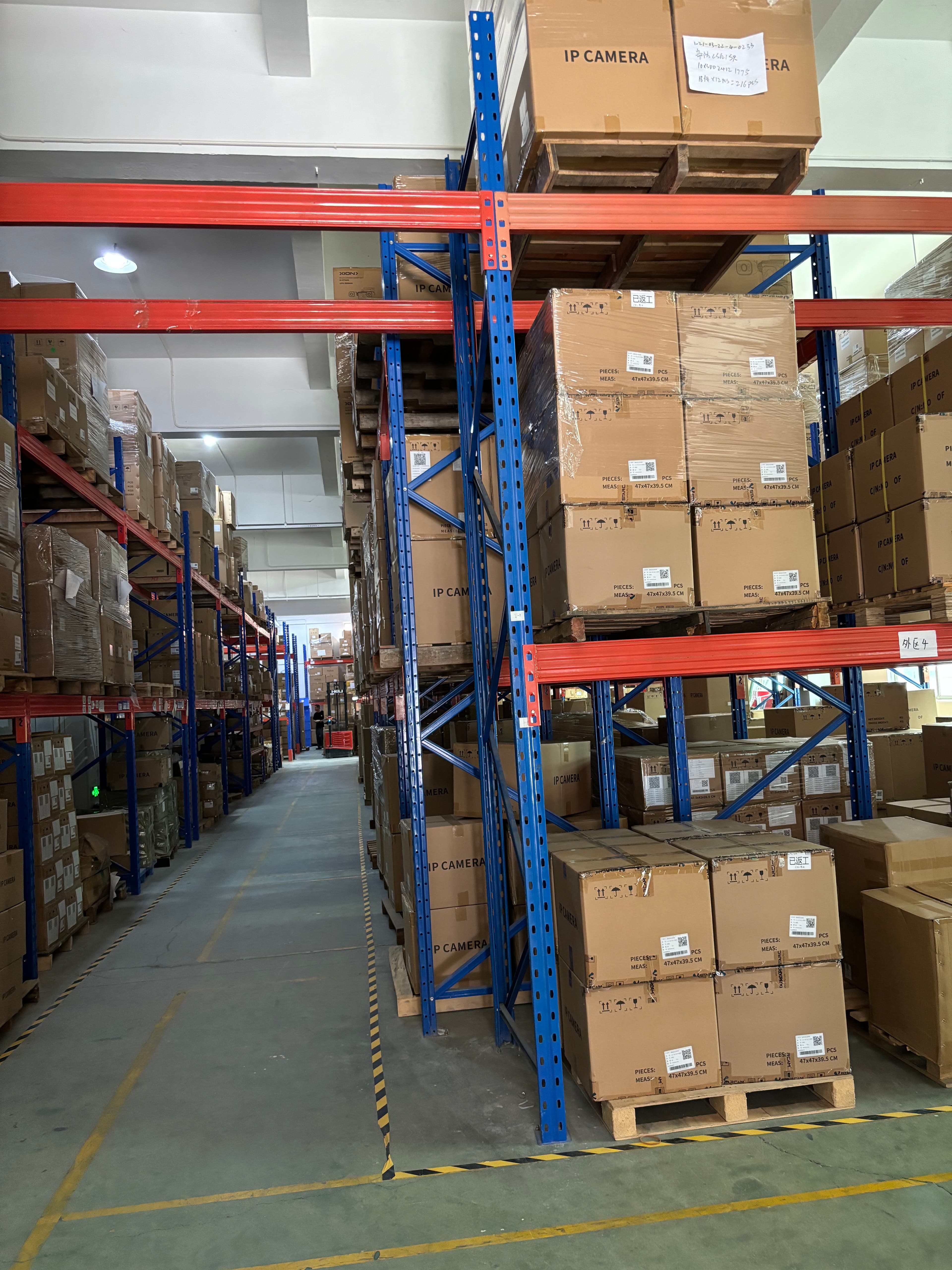 JBC shipment preparation area with packed camera goods